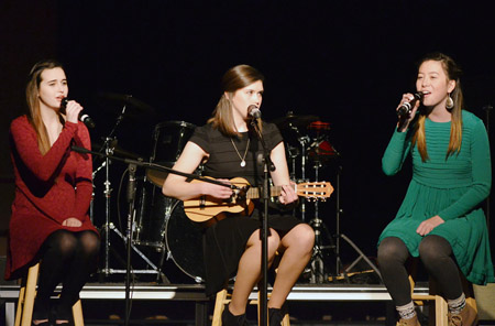 BENEFIT CONCERT - The Jan. 26 “Benefit Concert” at Pius X High School in Lincoln featured 26 performances by more than 50 students, including (from left) Hayley Heath, Nicole Olsen and Kylie Tucker. The event raised more than $1,300 for a Catholic missionary group in the Philippines. (Photo courtesy Pius X)